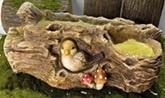 GARDEN FIGURE PLANTER WITH BIRD